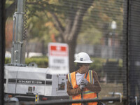 On November 4, 2024, in Washington, DC, a day before election day, the Secret Service and businesses board up the front of buildings and pla...