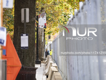 Crews outside Howard University in Washington, DC, on November 4, 2024, put up fencing where Vice President Kamala Harris will have a watch...