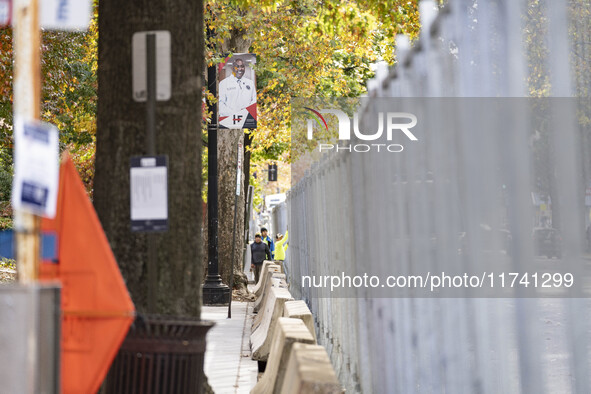 Crews outside Howard University in Washington, DC, on November 4, 2024, put up fencing where Vice President Kamala Harris will have a watch...