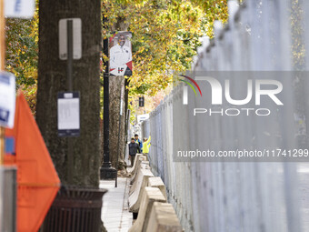 Crews outside Howard University in Washington, DC, on November 4, 2024, put up fencing where Vice President Kamala Harris will have a watch...