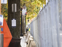 Crews outside Howard University in Washington, DC, on November 4, 2024, put up fencing where Vice President Kamala Harris will have a watch...