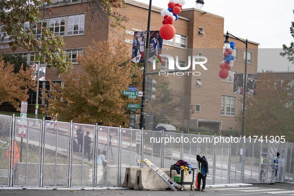 Crews outside Howard University in Washington, DC, on November 4, 2024, put up fencing where Vice President Kamala Harris will have a watch...