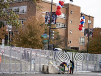 Crews outside Howard University in Washington, DC, on November 4, 2024, put up fencing where Vice President Kamala Harris will have a watch...