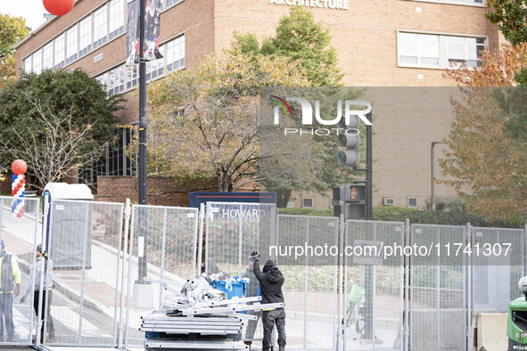 Crews outside Howard University in Washington, DC, on November 4, 2024, put up fencing where Vice President Kamala Harris will have a watch...