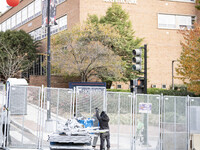 Crews outside Howard University in Washington, DC, on November 4, 2024, put up fencing where Vice President Kamala Harris will have a watch...