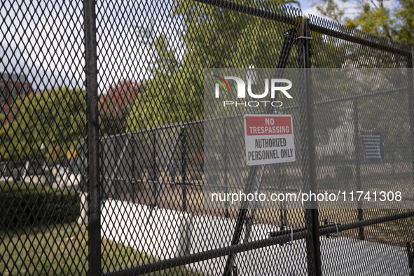 Crews outside the White House in Washington, DC, on November 4, 2024, reinforce the fence as a safety precaution. 