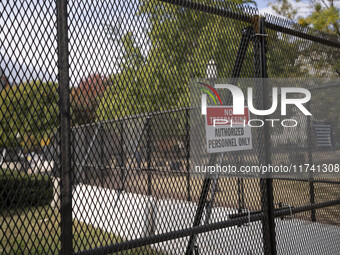 Crews outside the White House in Washington, DC, on November 4, 2024, reinforce the fence as a safety precaution. (