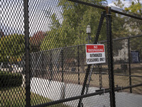 Crews outside the White House in Washington, DC, on November 4, 2024, reinforce the fence as a safety precaution. (