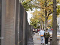 On November 4, 2024, in Washington, DC, a day before election day, the Secret Service and businesses board up the front of buildings and pla...