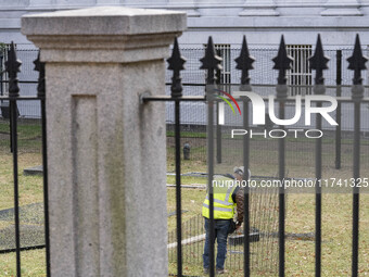 On November 4, 2024, in Washington, DC, a day before election day, the Secret Service and businesses board up the front of buildings and pla...