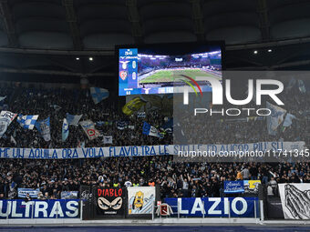 Supporters of S.S. Lazio are in action during the 11th day of the Serie A Championship between S.S. Lazio and Cagliari Calcio at the Olympic...