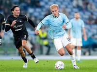 Gustav Isaksen of SS Lazio and Tommaso Augello of Cagliari Calcio compete for the ball during the Serie A Enilive match between SS Lazio and...