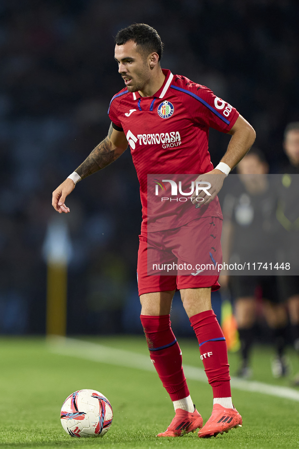 Alex Sola of Getafe CF is in action during the La Liga EA Sports match between RC Celta de Vigo and Getafe CF at Estadio Abanca Balaidos in...