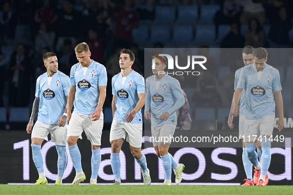 Anastasios Douvikas of RC Celta de Vigo (3L) celebrates with his teammates after scoring his team's first goal during the La Liga EA Sports...