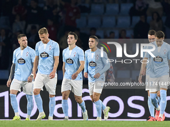 Anastasios Douvikas of RC Celta de Vigo (3L) celebrates with his teammates after scoring his team's first goal during the La Liga EA Sports...