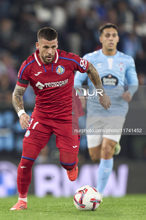 Carles Perez of Getafe CF is in action during the La Liga EA Sports match between RC Celta de Vigo and Getafe CF at Estadio Abanca Balaidos...