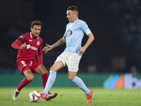 Iago Aspas of RC Celta de Vigo is challenged by Luis Milla of Getafe CF during the La Liga EA Sports match between RC Celta de Vigo and Geta...