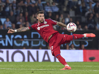 Carles Perez of Getafe CF shoots on goal during the La Liga EA Sports match between RC Celta de Vigo and Getafe CF at Estadio Abanca Balaido...