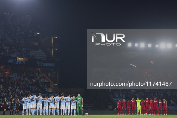 Players of RC Celta de Vigo and Getafe CF pause for a moment of silence to pay their respects to the victims of the flooding disaster in Spa...