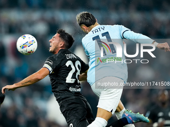 Gabriele Zappa of Cagliari Calcio and Taty Castellanos of SS Lazio jump for the ball during the Serie A Enilive match between SS Lazio and C...