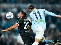 Gabriele Zappa of Cagliari Calcio and Taty Castellanos of SS Lazio jump for the ball during the Serie A Enilive match between SS Lazio and C...