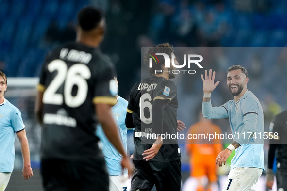 Taty Castellanos of SS Lazio greets Mina as he leaves the pitch receiving a red card during the Serie A Enilive match between SS Lazio and C...