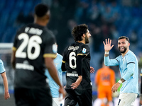 Taty Castellanos of SS Lazio greets Mina as he leaves the pitch receiving a red card during the Serie A Enilive match between SS Lazio and C...