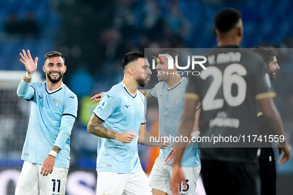 Taty Castellanos of SS Lazio greets Mina as he leaves the pitch receiving a red card during the Serie A Enilive match between SS Lazio and C...