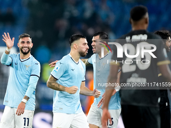 Taty Castellanos of SS Lazio greets Mina as he leaves the pitch receiving a red card during the Serie A Enilive match between SS Lazio and C...