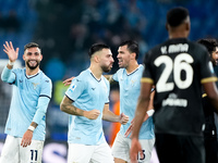 Taty Castellanos of SS Lazio greets Mina as he leaves the pitch receiving a red card during the Serie A Enilive match between SS Lazio and C...