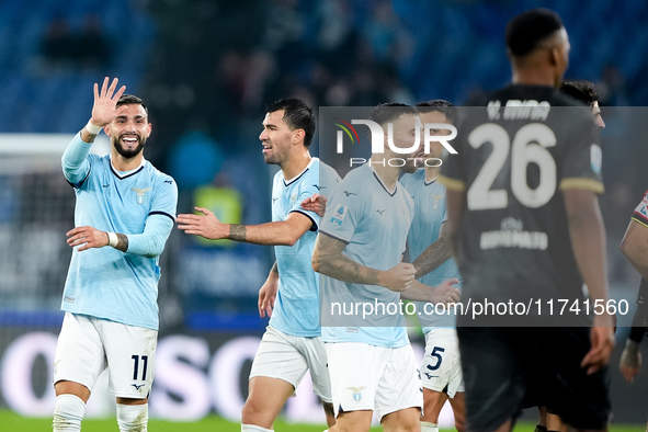 Taty Castellanos of SS Lazio greets Mina as he leaves the pitch receiving a red card during the Serie A Enilive match between SS Lazio and C...