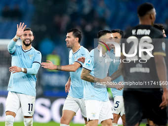 Taty Castellanos of SS Lazio greets Mina as he leaves the pitch receiving a red card during the Serie A Enilive match between SS Lazio and C...