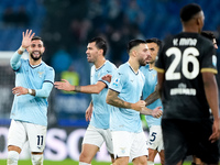 Taty Castellanos of SS Lazio greets Mina as he leaves the pitch receiving a red card during the Serie A Enilive match between SS Lazio and C...