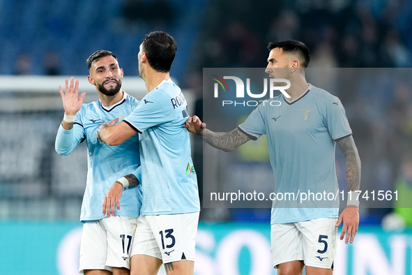 Taty Castellanos of SS Lazio greets Mina as he leaves the pitch receiving a red card during the Serie A Enilive match between SS Lazio and C...