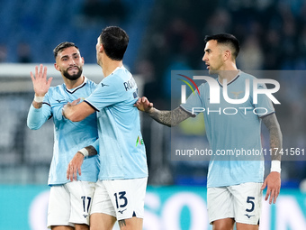 Taty Castellanos of SS Lazio greets Mina as he leaves the pitch receiving a red card during the Serie A Enilive match between SS Lazio and C...