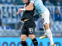 Roberto Piccoli of Cagliari Calcio and Alessio Romagnoli of SS Lazio jump for the ball during the Serie A Enilive match between SS Lazio and...