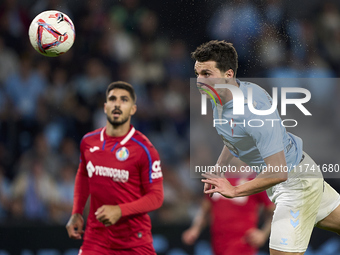 Anastasios Douvikas of RC Celta de Vigo heads the ball during the La Liga EA Sports match between RC Celta de Vigo and Getafe CF at Estadio...