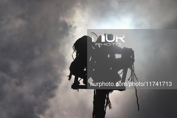 The Voladores of Cuetzalan perform a pre-Hispanic ritual ceremony that involves tying their feet with ropes and launching themselves into th...