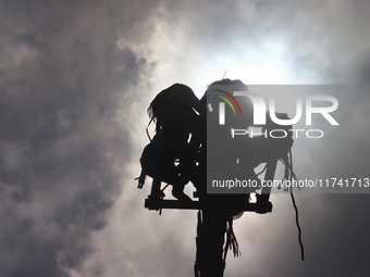 The Voladores of Cuetzalan perform a pre-Hispanic ritual ceremony that involves tying their feet with ropes and launching themselves into th...