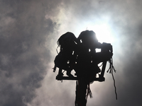 The Voladores of Cuetzalan perform a pre-Hispanic ritual ceremony that involves tying their feet with ropes and launching themselves into th...