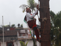 The Voladores of Cuetzalan perform a pre-Hispanic ritual ceremony that involves tying their feet with ropes and launching themselves into th...