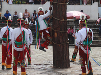 The Voladores of Cuetzalan perform a pre-Hispanic ritual ceremony that involves tying their feet with ropes and launching themselves into th...