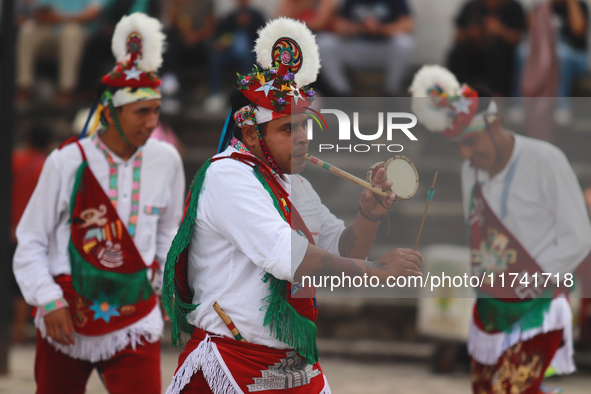 The Voladores of Cuetzalan perform a pre-Hispanic ritual ceremony that involves tying their feet with ropes and launching themselves into th...