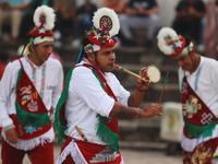 The Voladores of Cuetzalan perform a pre-Hispanic ritual ceremony that involves tying their feet with ropes and launching themselves into th...