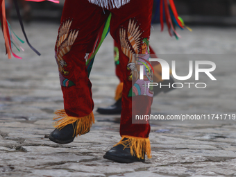 The Voladores of Cuetzalan perform a pre-Hispanic ritual ceremony that involves tying their feet with ropes and launching themselves into th...