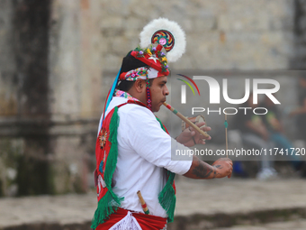 The Voladores of Cuetzalan perform a pre-Hispanic ritual ceremony that involves tying their feet with ropes and launching themselves into th...