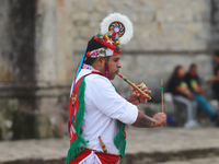 The Voladores of Cuetzalan perform a pre-Hispanic ritual ceremony that involves tying their feet with ropes and launching themselves into th...