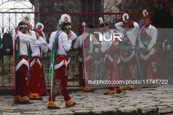 The Voladores of Cuetzalan perform a pre-Hispanic ritual ceremony that involves tying their feet with ropes and launching themselves into th...