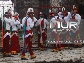 The Voladores of Cuetzalan perform a pre-Hispanic ritual ceremony that involves tying their feet with ropes and launching themselves into th...