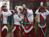 The Voladores of Cuetzalan perform a pre-Hispanic ritual ceremony that involves tying their feet with ropes and launching themselves into th...